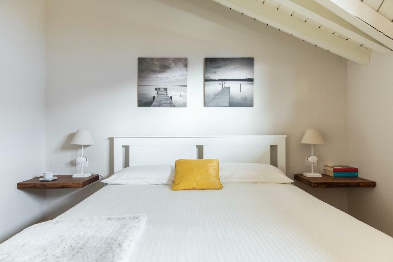 Apartamento Mansarda I Cipressi Lenno Exterior foto