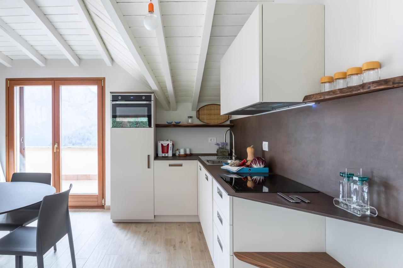 Apartamento Mansarda I Cipressi Lenno Exterior foto