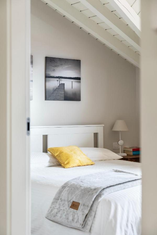 Apartamento Mansarda I Cipressi Lenno Exterior foto